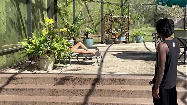 Pool boy catches bosses wife topless sunbathing