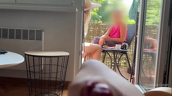 My husband is jerking off and cum in front of my stepmom a while we talk on balcony.
