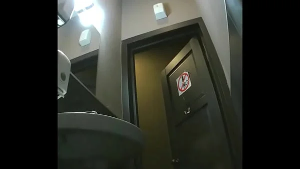 MOV 96. Girls piss in the toilet of the cafe