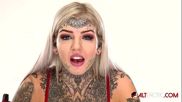 Behind the scenes for Amber Luke's new face tattoo